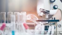 Microscope with some test tubes